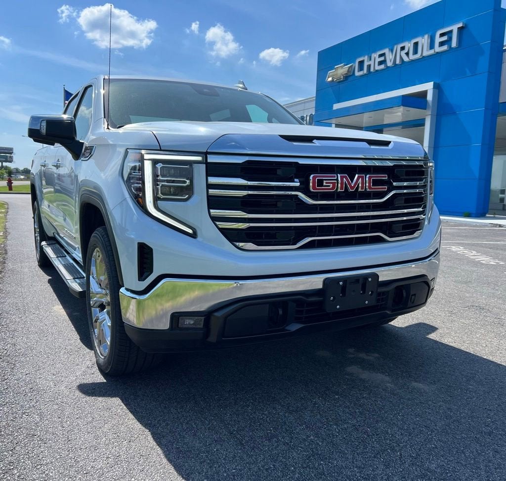 2026 GMC Sierra 1500 SLT in Glacier White Tricoat — front three-quarter view