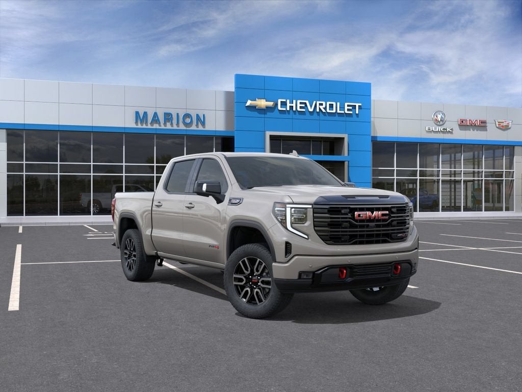 2026 GMC Sierra 1500 AT4 in Coastal Dune — front three-quarter view