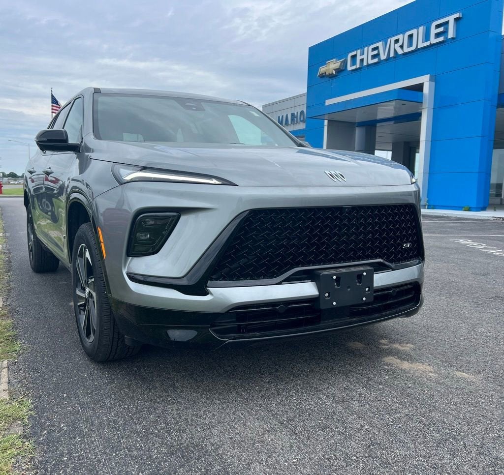 2026 Buick Enclave Sport Touring in Moonstone Gray Metallic — front three-quarter view