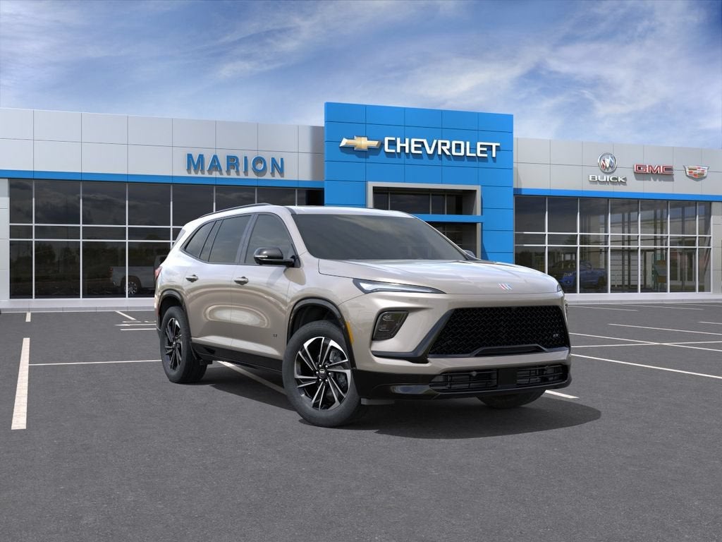 2026 Buick Enclave Sport Touring in Stone Metallic — front three-quarter view